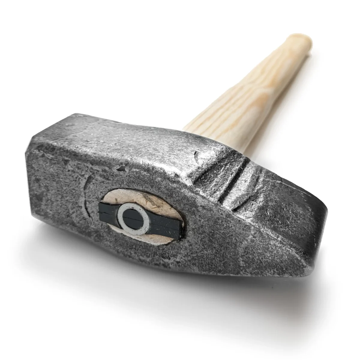 Ristikkäispuhallusvasara